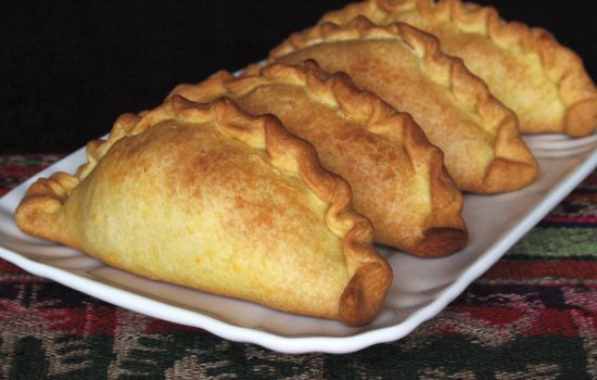 Saltenha (Savoury pastry filled with chicken)