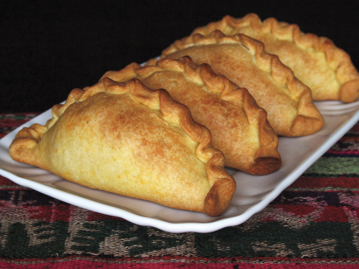 Saltenha (Savoury pastry filled with chicken)